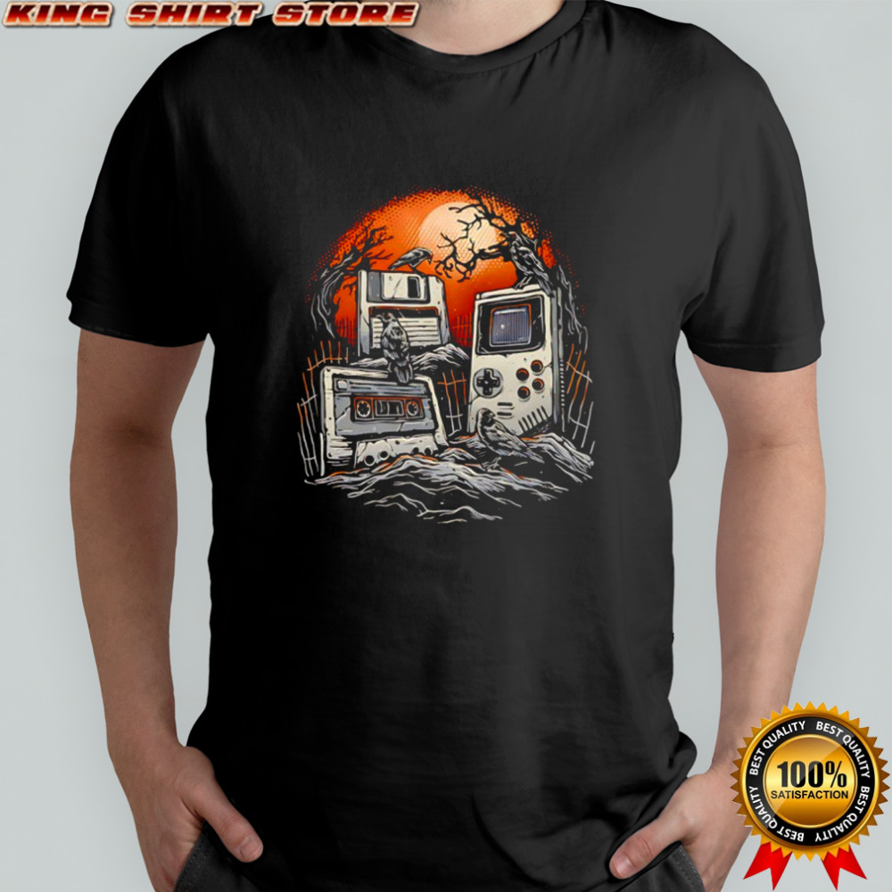 A cemetery of obsolete technology a floppy disk a cassette tape and a Game Boy shirt