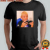 Dominik Mysterio wearing his younger self playing the PSP shirt
