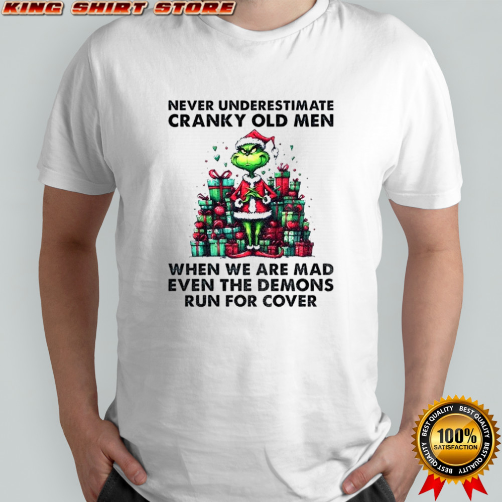 Grinch Santa hat never underestimate cranky old men when we are mad even the demons run for cover Christmas shirt
