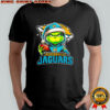 Grinch wearing Santa x Jacksonville Jaguars hat Christmas shirt