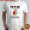 Official Grinch Santa for my age I have a lot going for me my eyes are going my knees are going my back is going shirt