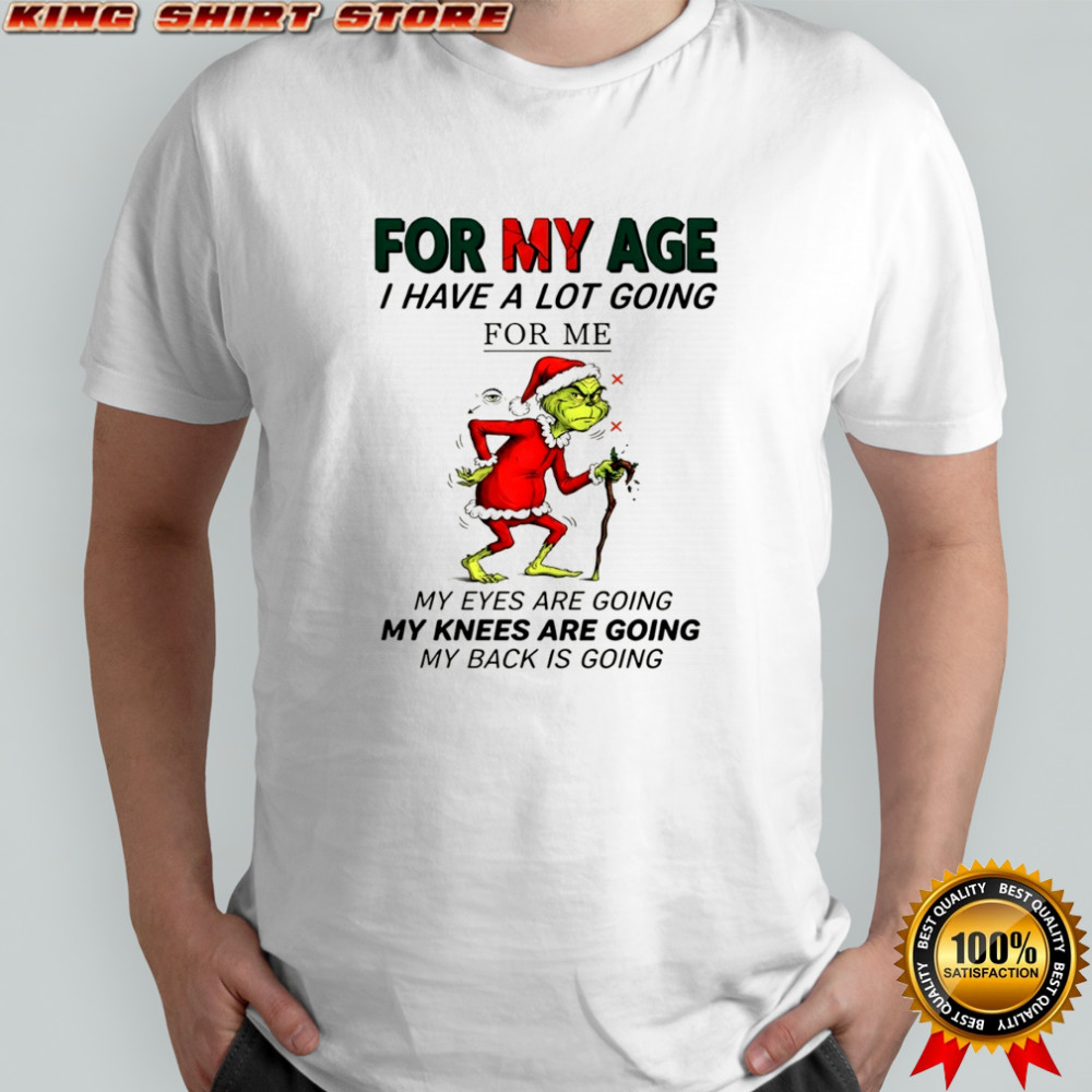 Official Grinch Santa for my age I have a lot going for me my eyes are going my knees are going my back is going shirt